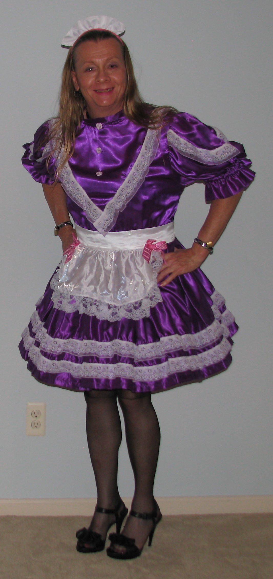 Chrisissy in her purple Sissy Maid Uniform ready to serve